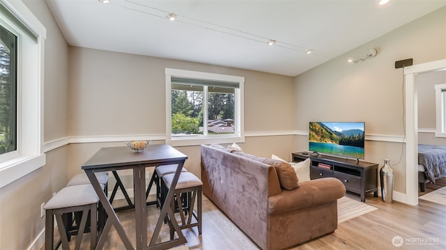 living area with wood finished floors