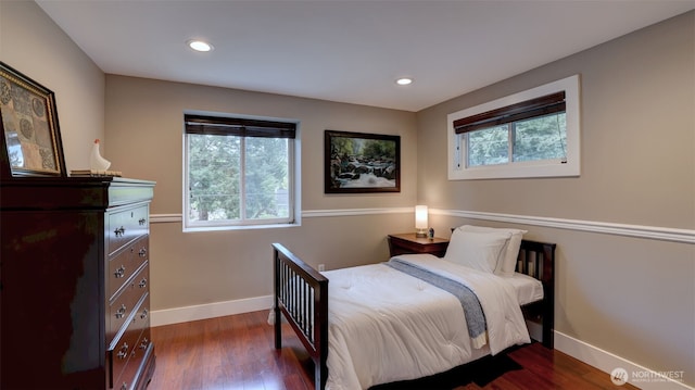 bedroom featuring recessed lighting, baseboards, and wood finished floors