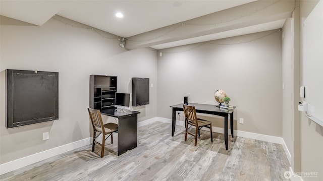 office area featuring baseboards, recessed lighting, and light wood-style floors