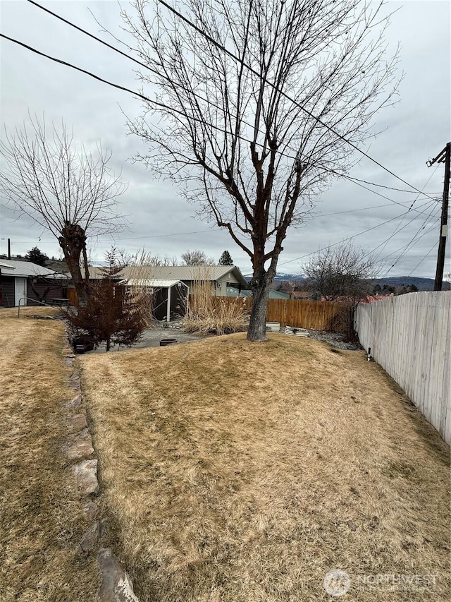 view of yard featuring fence