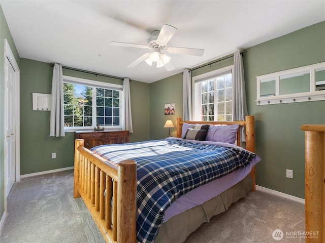 bedroom featuring ceiling fan, carpet floors, and baseboards