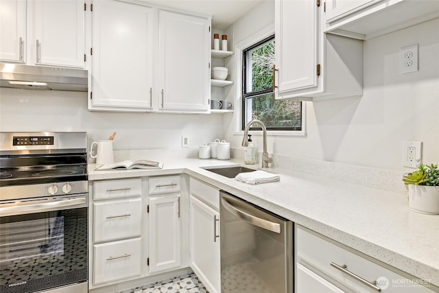 kitchen featuring a sink, under cabinet range hood, stainless steel appliances, white cabinetry, and open shelves