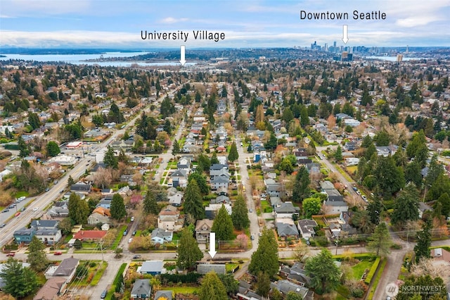 aerial view with a residential view and a water view