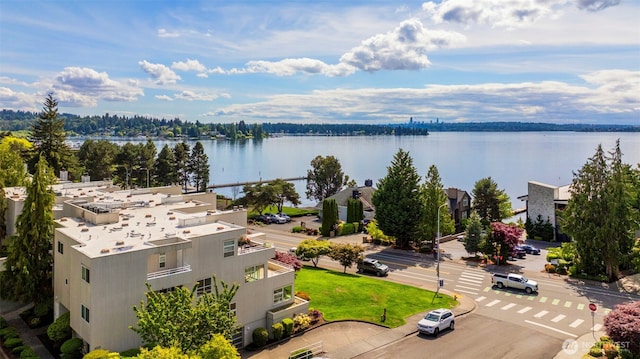 birds eye view of property featuring a water view