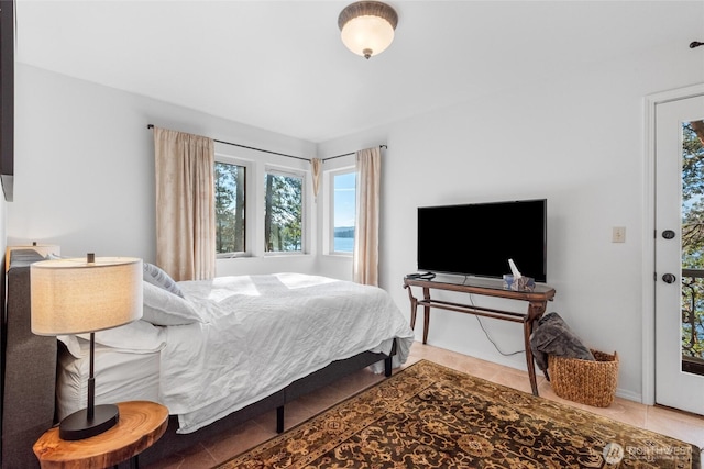 bedroom featuring tile patterned floors