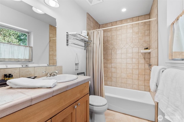 full bath with toilet, visible vents, vanity, tile patterned floors, and shower / bath combo with shower curtain