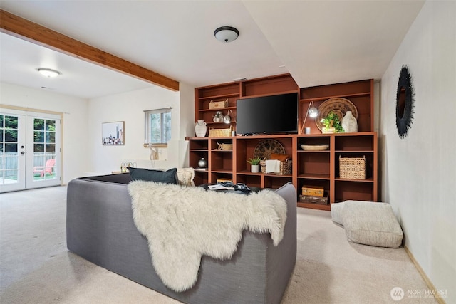 living room with carpet floors, french doors, beam ceiling, and baseboards