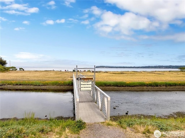 view of home's community featuring a water view