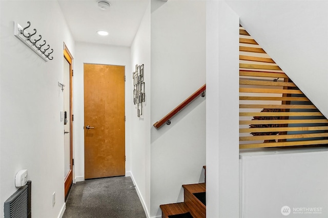 interior space with recessed lighting, baseboards, and stairs