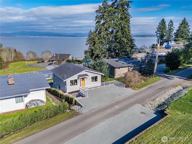 drone / aerial view featuring a water view