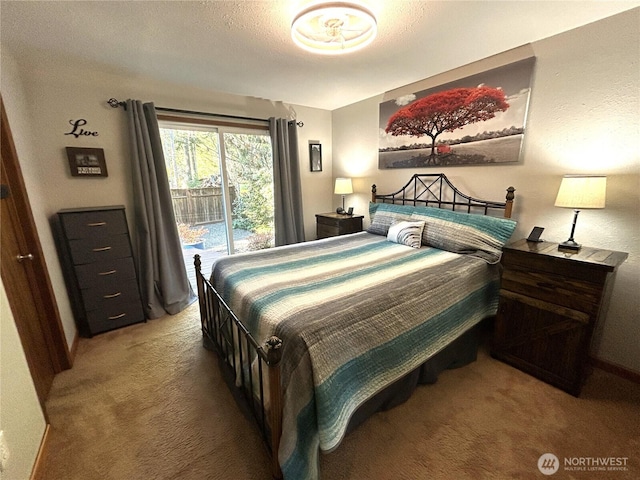 carpeted bedroom with a textured ceiling