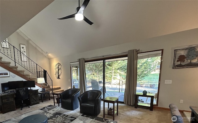 living area with carpet, lofted ceiling, ceiling fan, baseboards, and stairs