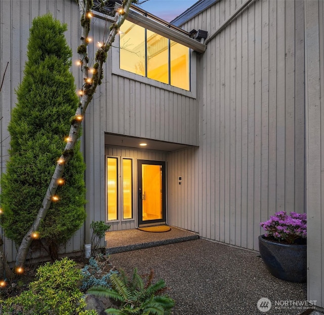 property entrance featuring a patio area