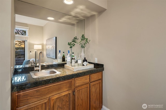 bathroom with vanity and recessed lighting