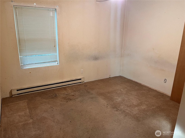 12535 SE Kent Kangley Rd, Kent, WA 98030 - empty room featuring a baseboard radiator and carpet flooring