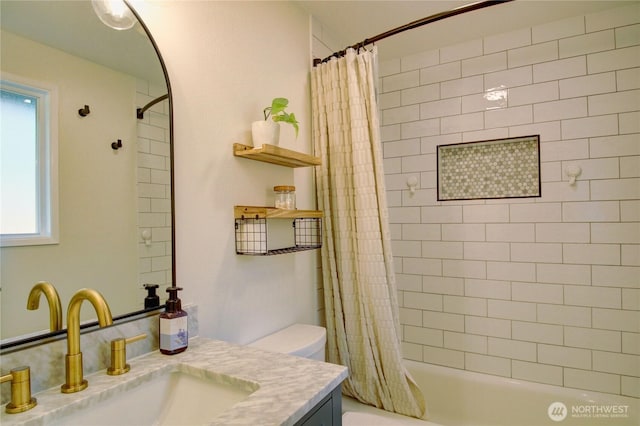 full bathroom with shower / tub combo, toilet, and vanity