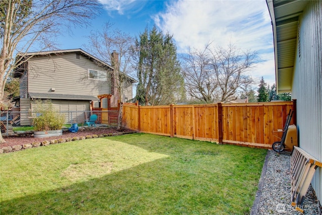 view of yard featuring a fenced backyard