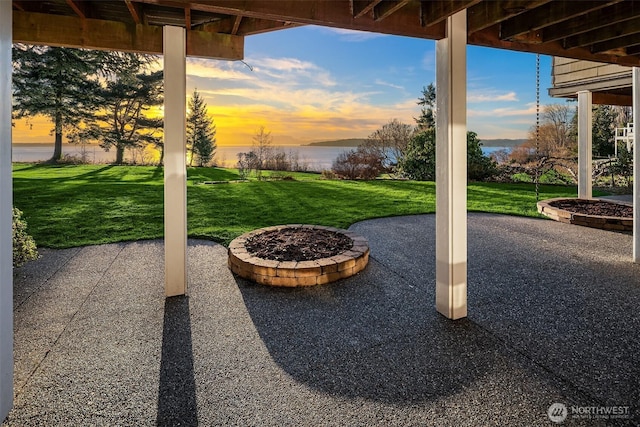 view of patio / terrace with a fire pit