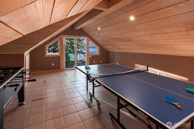 playroom with lofted ceiling with beams, wood ceiling, and tile patterned floors