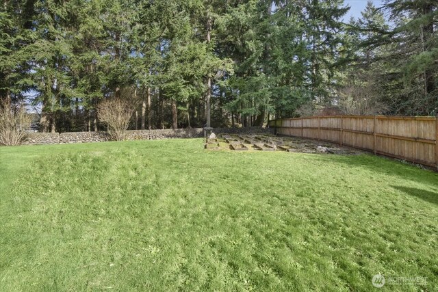 view of yard with fence