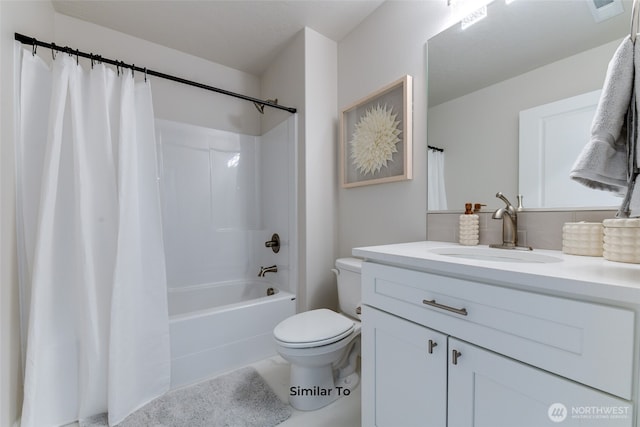 bathroom with shower / bathtub combination with curtain, visible vents, vanity, and toilet