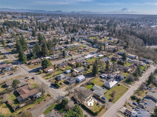 aerial view featuring a residential view and a mountain view