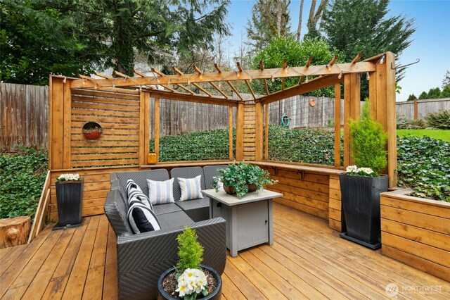 deck with fence, a pergola, and an outdoor hangout area