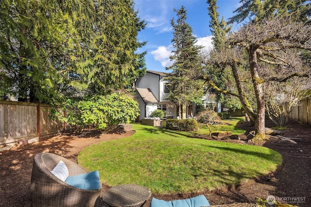 view of yard featuring a fenced backyard