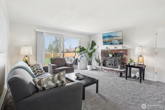 carpeted living area with baseboards