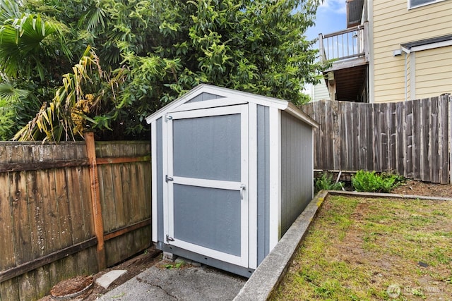 view of shed featuring a fenced backyard