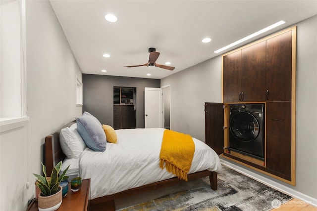 bedroom featuring recessed lighting, washer / dryer, and ceiling fan