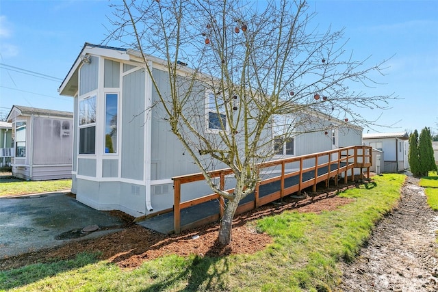 rear view of property with crawl space