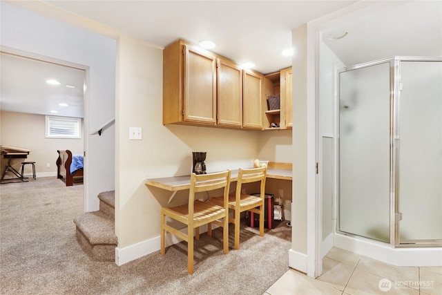 office area featuring baseboards, recessed lighting, light tile patterned flooring, and light colored carpet