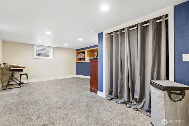 interior space featuring carpet floors, baseboards, and recessed lighting