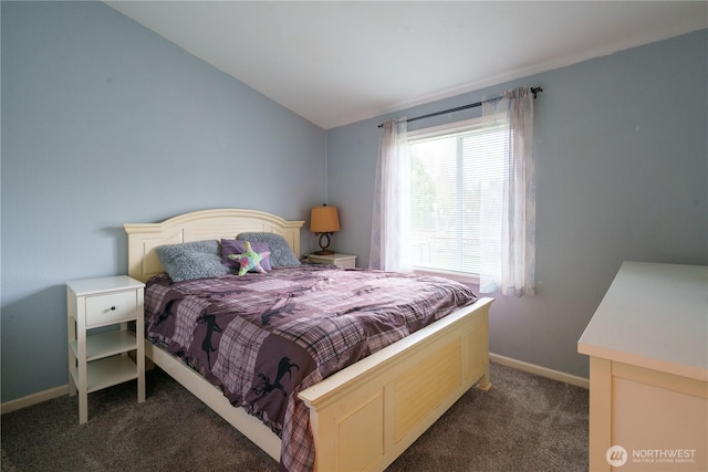 bedroom featuring lofted ceiling, carpet flooring, and baseboards