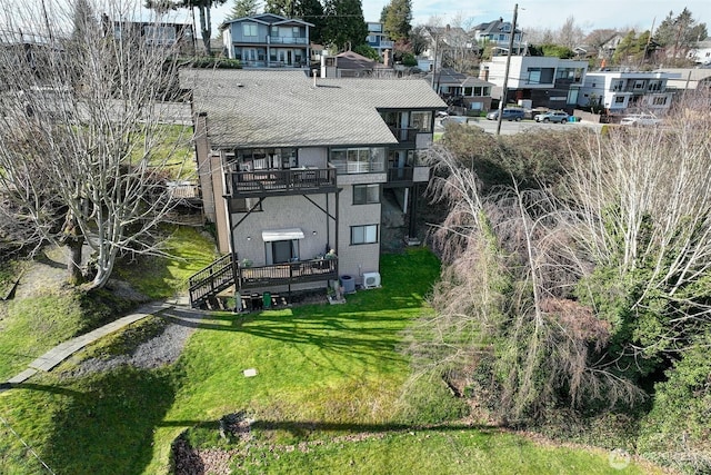 birds eye view of property with a residential view