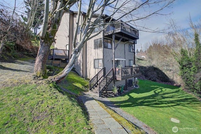 view of home's exterior featuring a yard