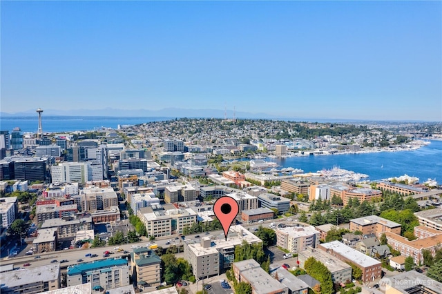 aerial view featuring a water view and a city view