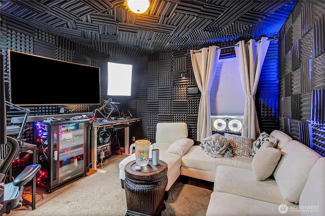 carpeted living room with an ornate ceiling