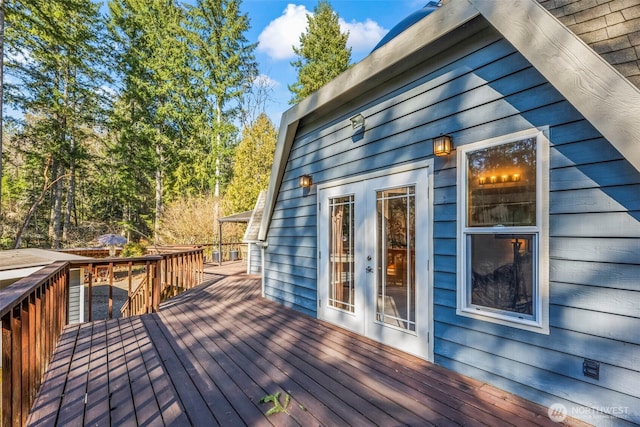 wooden terrace featuring french doors