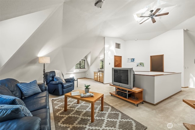 living area featuring lofted ceiling and light carpet