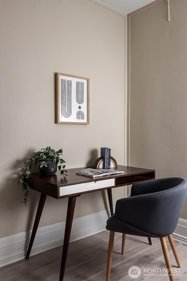 office area featuring wood finished floors and baseboards