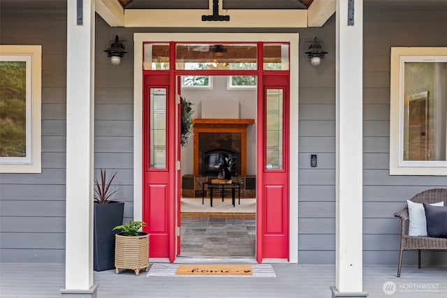 property entrance featuring a porch