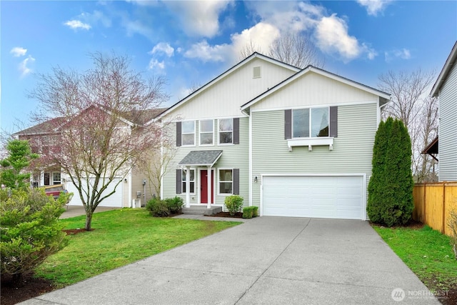 traditional-style house featuring a garage, concrete driveway, a front lawn, and fence