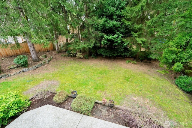 view of yard featuring fence