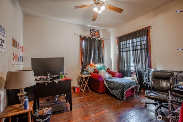 bedroom featuring ceiling fan and hardwood / wood-style floors