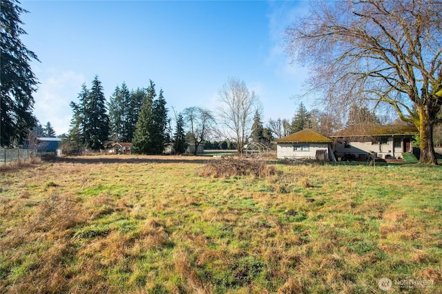 view of yard with fence