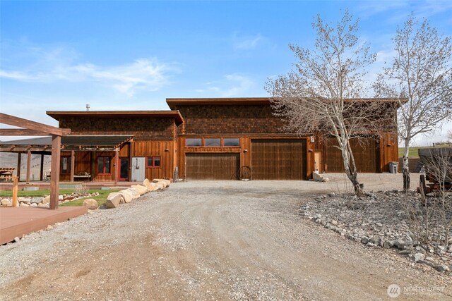 74 Sawtooth View Rd, Pateros, WA 98846 - view of front of home with dirt driveway and a garage
