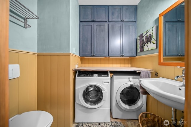 74 Sawtooth View Rd, Pateros, WA 98846 - washroom featuring a wainscoted wall and washing machine and clothes dryer