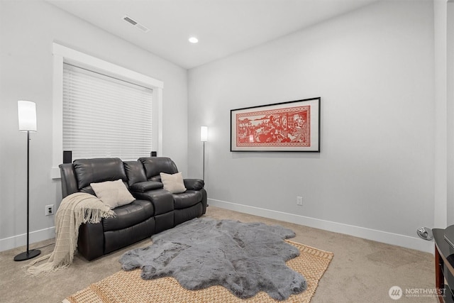 living room with light carpet, recessed lighting, visible vents, and baseboards